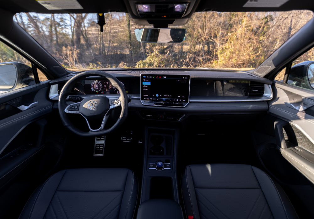 2026 Volkswagen Tiguan interior, including the front dash, infotainment system, and steering wheel.